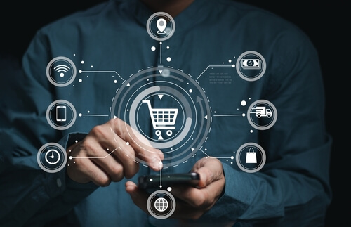 A,Businessman,Touch,E-commerce,And,Online,Shopping,Symbols,,Signifying,The