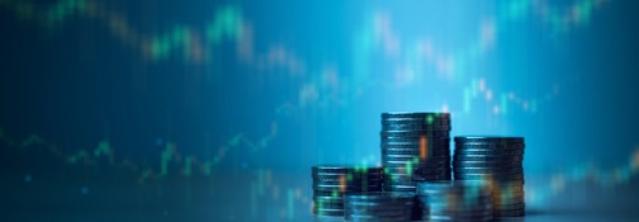Stacked,Coins,With,Financial,Market,Chart,Background,Representing,Investment,Portfolio,